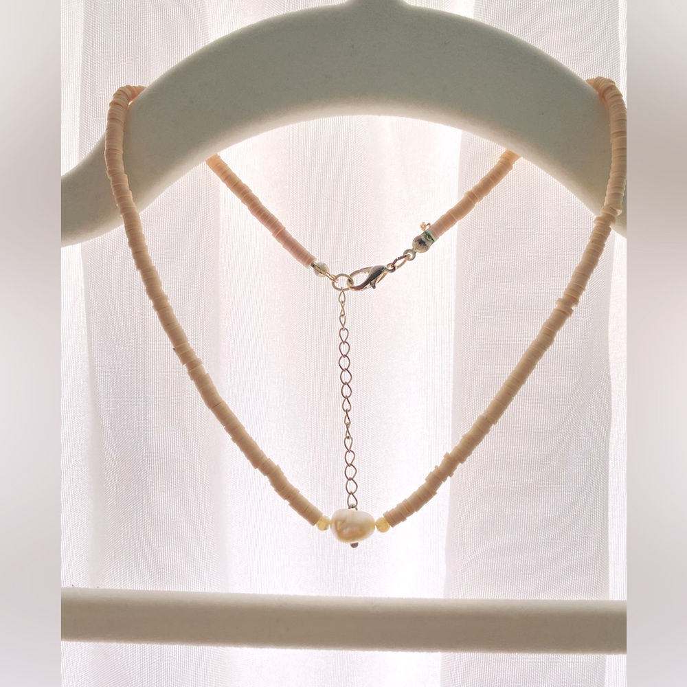 Pearl necklace with clay beads